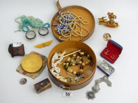 A leather collar box containing various items of costume jewellery and a pair of silver rimmed