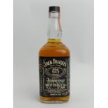 A 78% proof bottle of Jack Daniels whisky, un-opened and dating from 1980. 70cl. UK Postage £16.