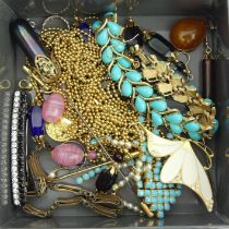 A collection of mostly costume jewellery including a 15ct gold ring, 2.2 grams. UK Postage £12.
