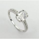 9ct white gold topaz and diamond ring, 1.9 grams, 8mm, size N1/2. UK Postage £12.
