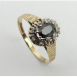 9ct gold sapphire and diamond ring, Birm. 1985, 1.8 grams, 10.2mm, size P1/2. UK postage £12.