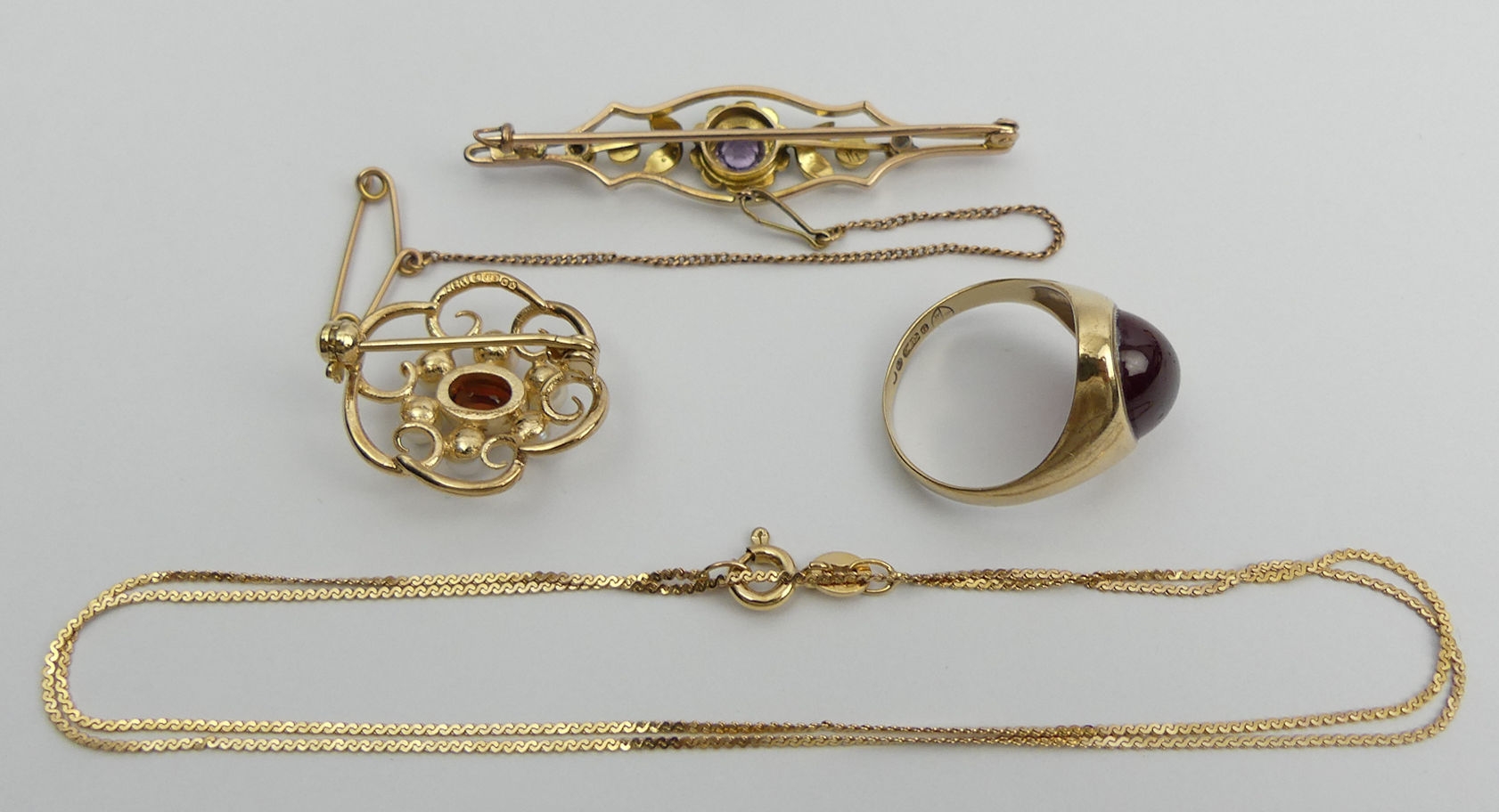 Two 9ct gold stone set brooches, a 9ct gold chain, and a 9ct gold signet ring Size M, 11.5 grams - Image 2 of 2