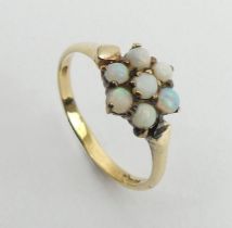 9ct gold opal seven stone ring,1.7 grams, 9.3mm, size N, UK postage £12.