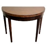 Edwardian mahogany D end fold over card table on tapering legs. 95 x 74 cm. Collection only.
