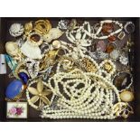 A collection of costume and silver jewellery, including a 15ct gold floral brooch and a gold back