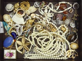 A collection of costume and silver jewellery, including a 15ct gold floral brooch and a gold back