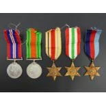 World War II medal group including The Africa Star and The Italy Star with paperwork. UK Postage £