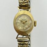 Ladies 9ct gold Rotary watch on an expanding strap, 15mm wide inc. button. UK Postage £12.