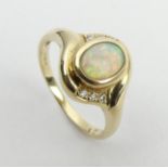 9ct gold opal and diamond ring, 2.6 grams, 12.3mm, size M1/2. UK Postage £12.