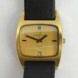 Eternamatic gold tone date adjust 2002 gents curved watch on a black leather strap, 1970's.