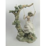Lladro porcelain figure 'Girl on a Swing' model 1297, 40cm. Collection Only