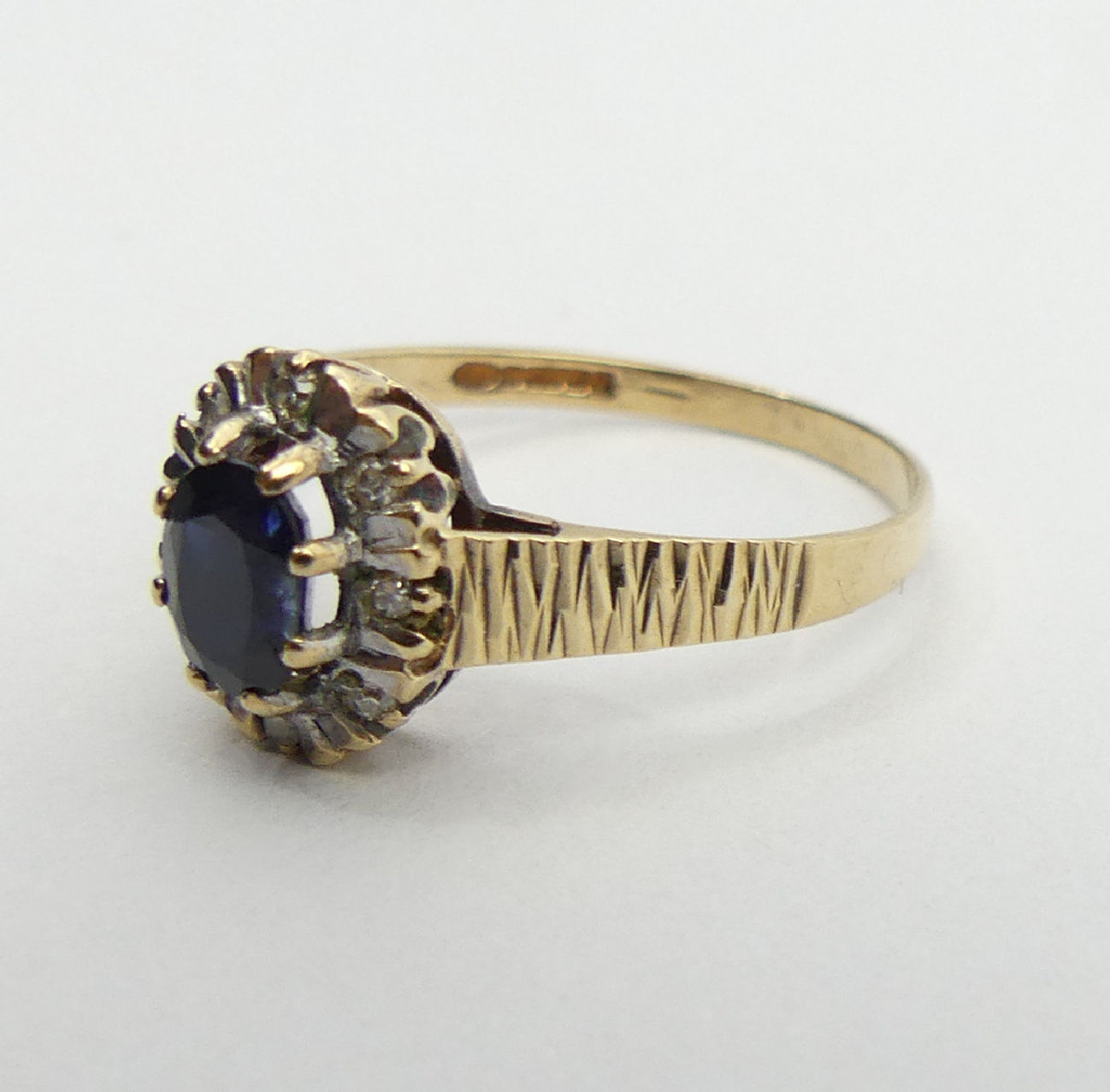 9ct gold sapphire and diamond ring, Birm. 1985, 1.8 grams, 10.2mm, size P1/2. UK postage £12. - Image 3 of 6