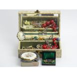 A jewellery box and contents, including a Stratton compact and a Victorian brooch. UK Postage £12.