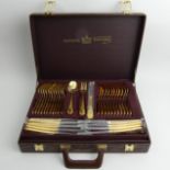 A Solingen gold plated cutlery set in a fitted leather case, as new. UK Postage £18.