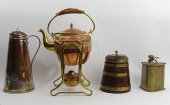 A copper and brass kettle on stand, two copper dishes, a coopered oak jar and cover, along with a
