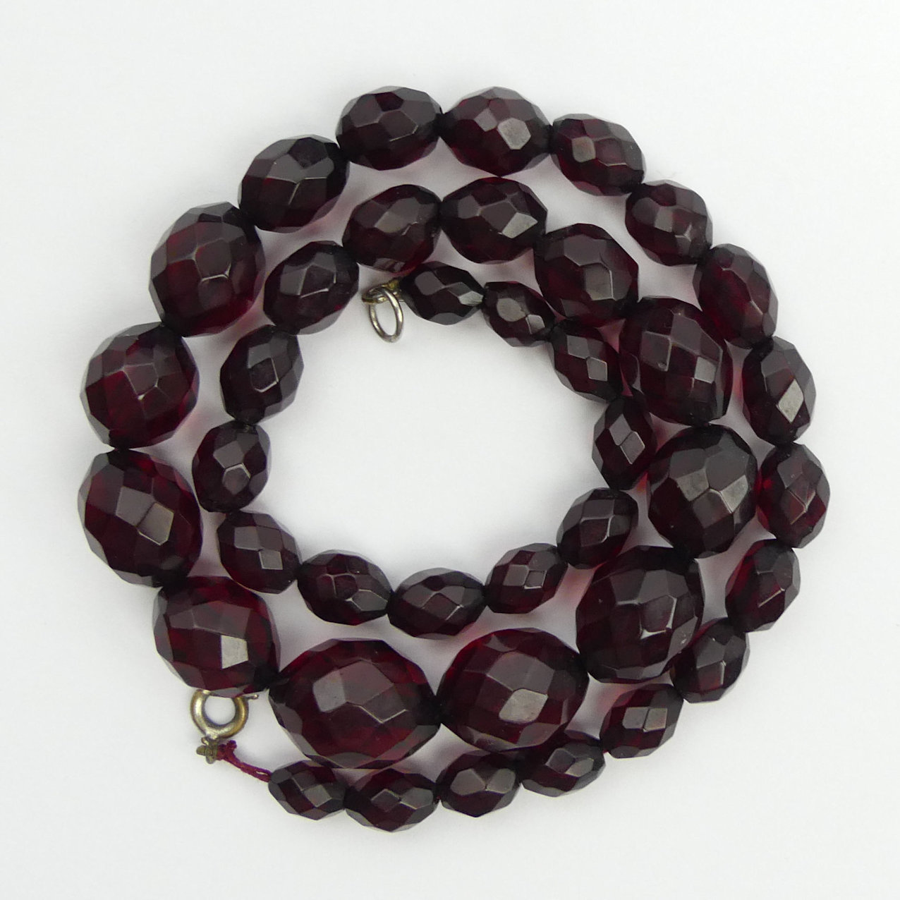 Cherry amber, Bakelite faceted bead necklace, 28.6 grams, 14mm x 19mm largest bead, 48cm long. UK