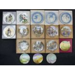 Fourteen Wedgwood, Davenport and other wall plates. UK Postage £18