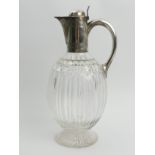 Victorian silver topped cut glass claret jug, London 1881, Richard Martin & Ebenezer Hall, 26cm.