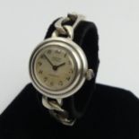 Ladies silver manual wind Hurisa watch, 28.6, 28mm wide inc. button, 17cm long. UK Postage £12