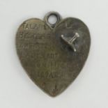 Unusual Boer War heart pendant with dagger piercing and battles to one side, the other with