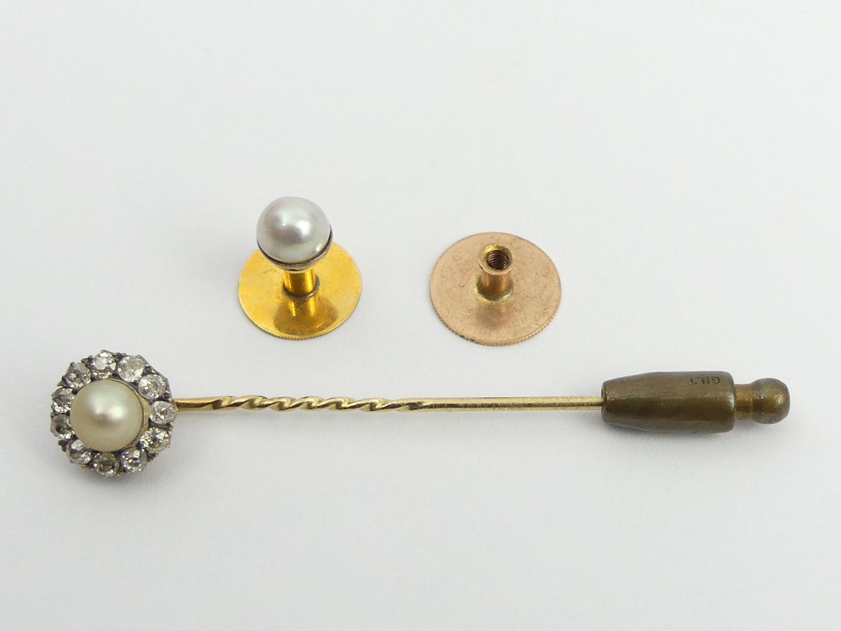 Diamond and cultured pearl stick pin, boxed, and a 9ct gold stud, 4.6 grams gross, stick pin 58mm.