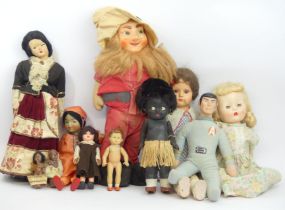 A group of eleven mostly mid-20th century dolls along with a cloth Knickerbocker figure of Spock.