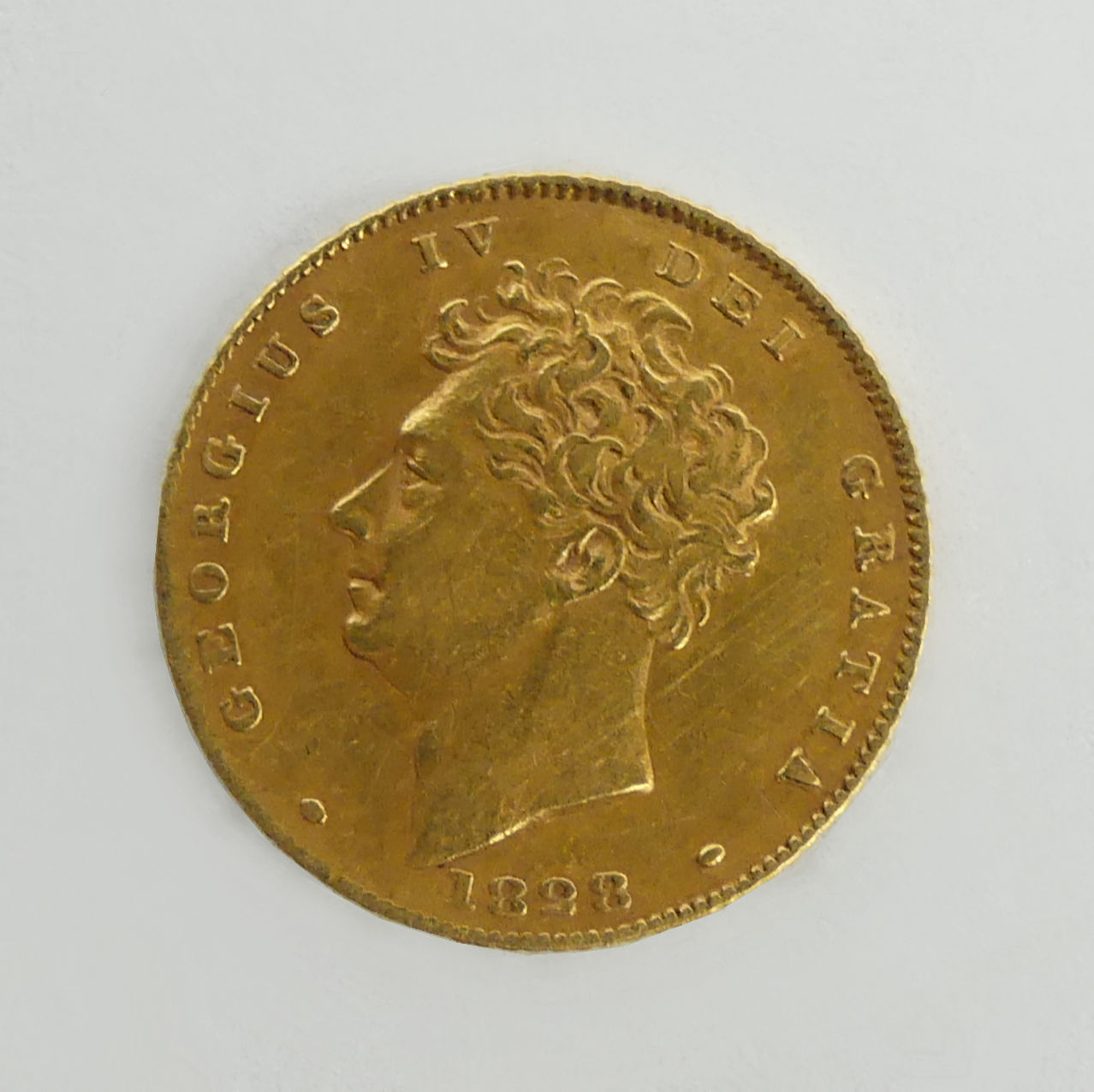 George IV 1828 gold half sovereign. UK Postage £12. - Image 2 of 3