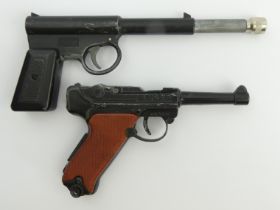 A Gat gun and Luger replica. UK Postage £12.