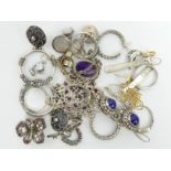 Various items of silver jewellery including rings, stone set pendants, ornate earrings and a stone