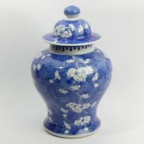 19th Century Chinese blue & white porcelain Prunus vase and cover, 32 cm. UK Postage £18.