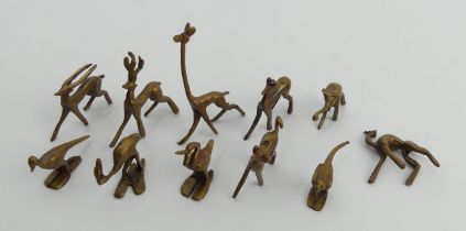 Eleven Ashanti bronze gold weights, tallest 6cm. UK Postage £12.