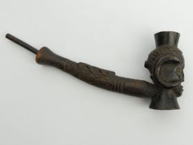 Early 20thCentury, carved wood ritual fertility pipe, possibly Yoruba tribe, West Africa.