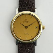 Ladies Omega De Ville date adjust watch with the original box and warranty card. UK Postage £12.