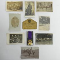 Purple Heart military medal USA, various World War I photos and a Black Watch brass name plaque.