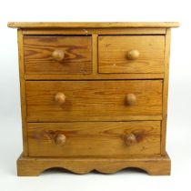 A small chest of pine drawers, 52cm x 51cm x 31cmm. Collection Only.