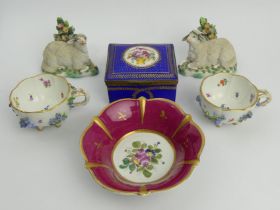 Two Meissen porcelain floral cabinet cups, a pair of Samson sheep, a hinged porcelain trinket box