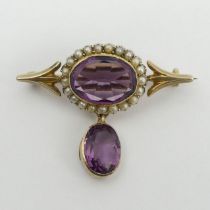 10ct gold amethyst and seed pearl brooch, 5.1 grams, 25mm x 26mm. UK Postage £12.