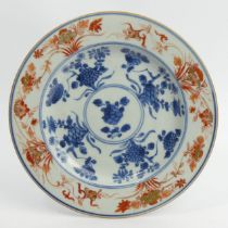 Chinese 18th Century underglaze blue and iron red porcelain cabinet plate, 21.7cm diameter. UK