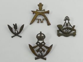 Four Gurkha Regiment cap badges. UK Postage £12.