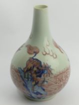 Chinese porcelain, Kangxi marks, underglaze blue and iron red dragon design bottle vase, (neck