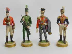 Four German porcelain figures of soldiers, 22cm. UK Postage £16. UK Postage £20.