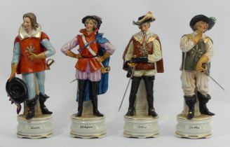 Athos, Porthos, Aramis and D'Artagnan musketeer china figures. UK Postage £18.