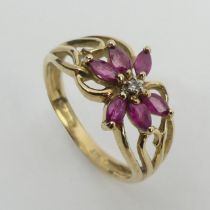 9ct gold ruby and diamond ring, 2.2 grams, 9.3mm, size M. UK Postage £12.
