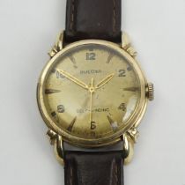 Bulova self-winding gold plated gents watch on a leather strap, 32mm wide. UK Postage £12. Condition