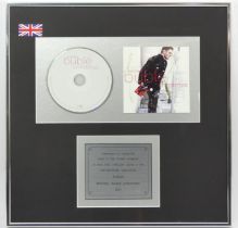 Michael Buble Christmas CD framed in recognition of 1,400,000 copies sold. Collection only.