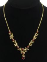 9ct gold garnet necklace, 14.4 grams, 43cm. UK Postage £12.