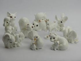Ten Osborne white bone china animals, cat 13cm.UK Postage £16.