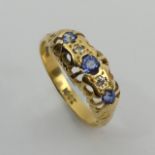18ct gold three stone sapphire and diamond ring, 3.1 grams, 6.9mm, size O. UK postage £12.