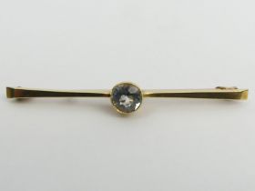 15ct gold aquamarine set bar brooch, 3.7 grams, 53mm x 9mm. UK Postage £12.