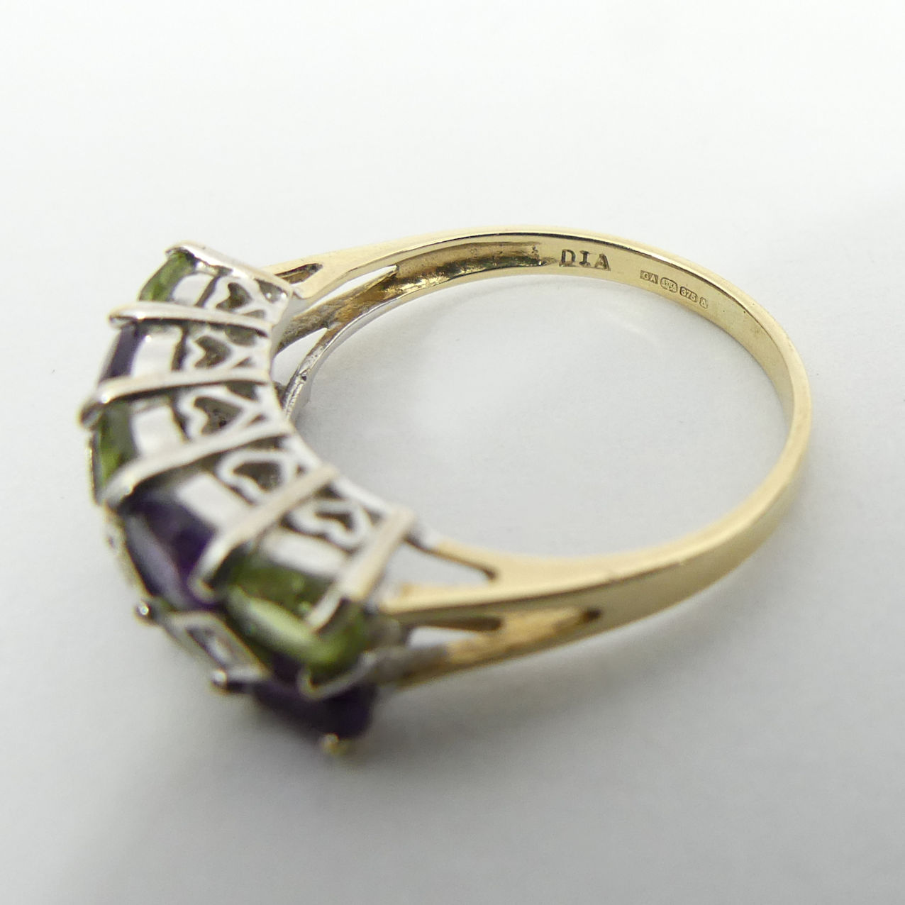 9ct gold peridot, amethyst and diamond ring, 2.4 grams, 6.6mm, size M 1/2. UK Postage £12. - Image 6 of 6